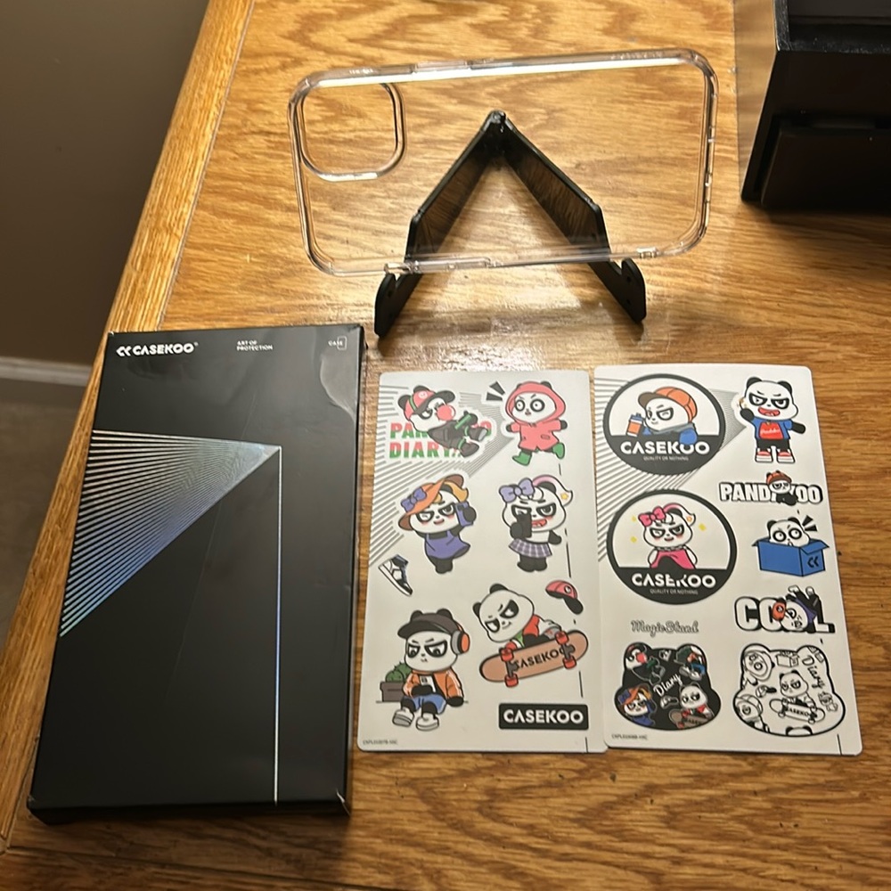 Casekoo clear iPhone 14 case with stickers and stand